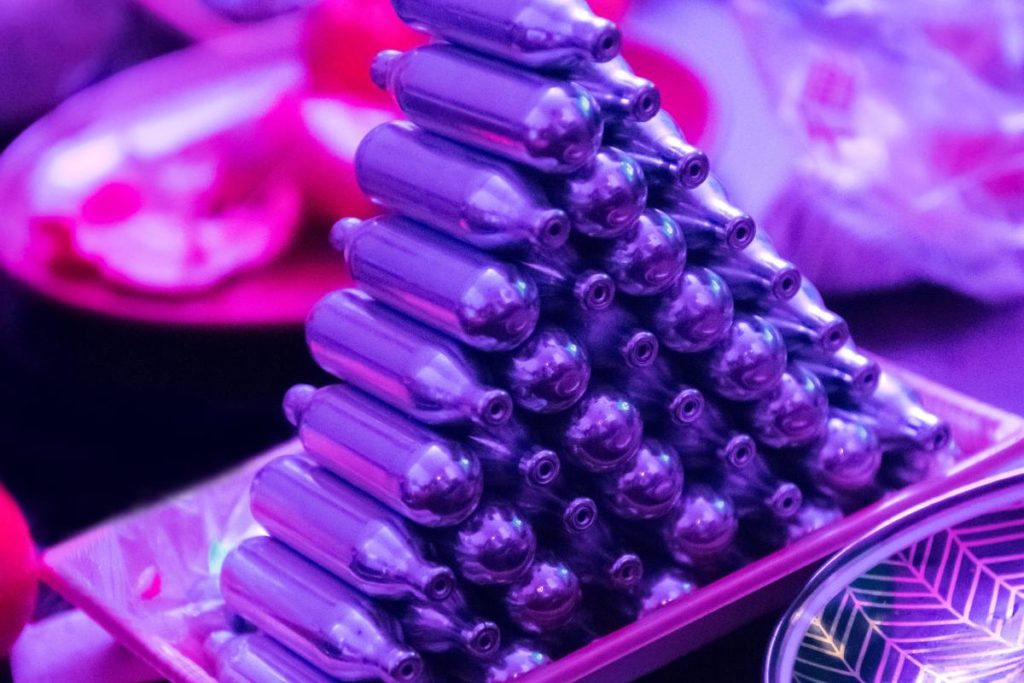 a stack of nitrous containers which answers the question what are whip-its