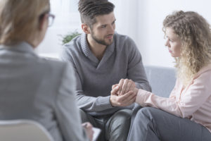 couple meets with therapist