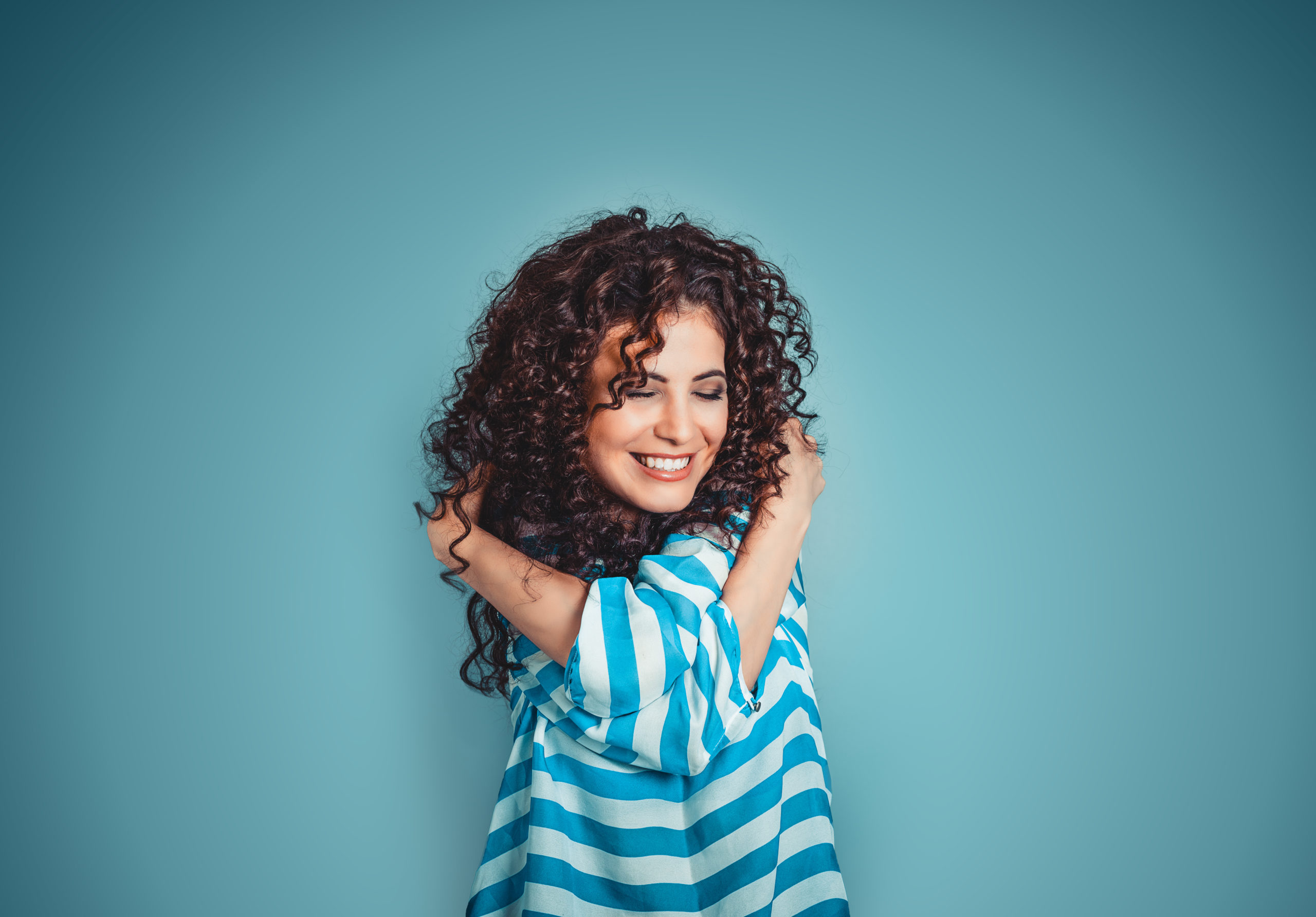 woman hugs herself