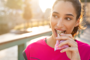 woman eats healthy snack