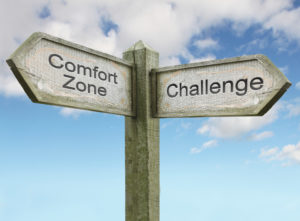 sign marked comfort zone and challenge