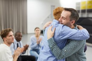 therapy group meets to discuss kindness