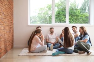 young people meet in therapy group