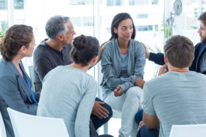 group participates in addiction therapy