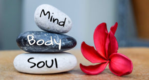 rocks labeled mind body and soul