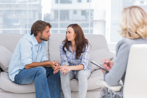 couple discusses signs of a toxic relationship with therapist