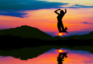 woman jumps into lake