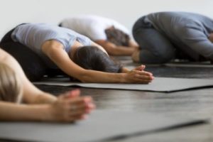 people participate in a yoga therapy program 