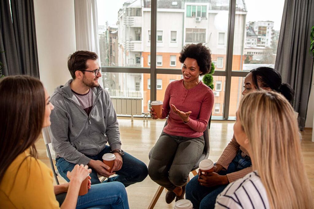 A group of people in a sober living program