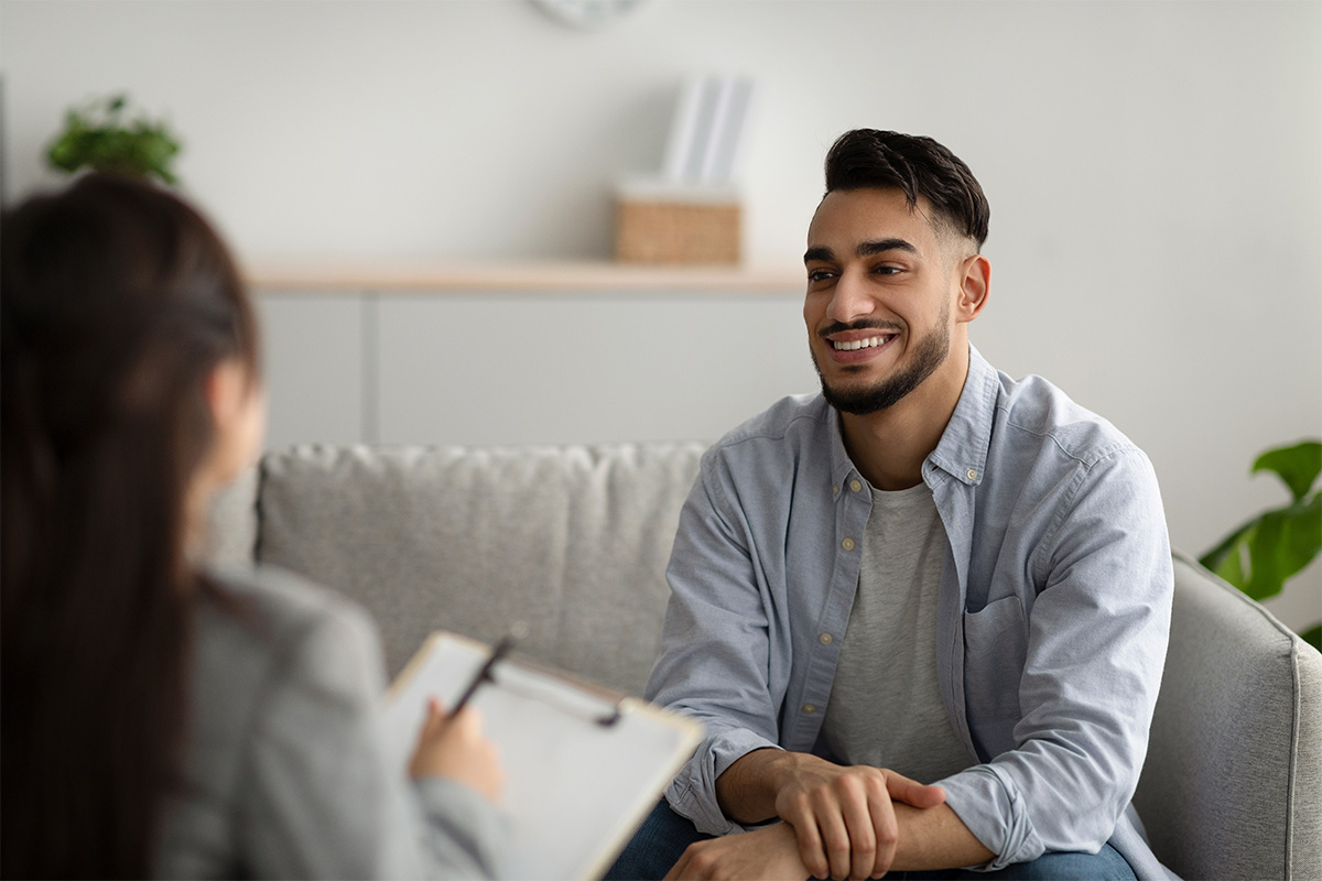 young man speaking to behavioral health specialist about ketmine addiction recovery and finding hope, support, and lasting change.